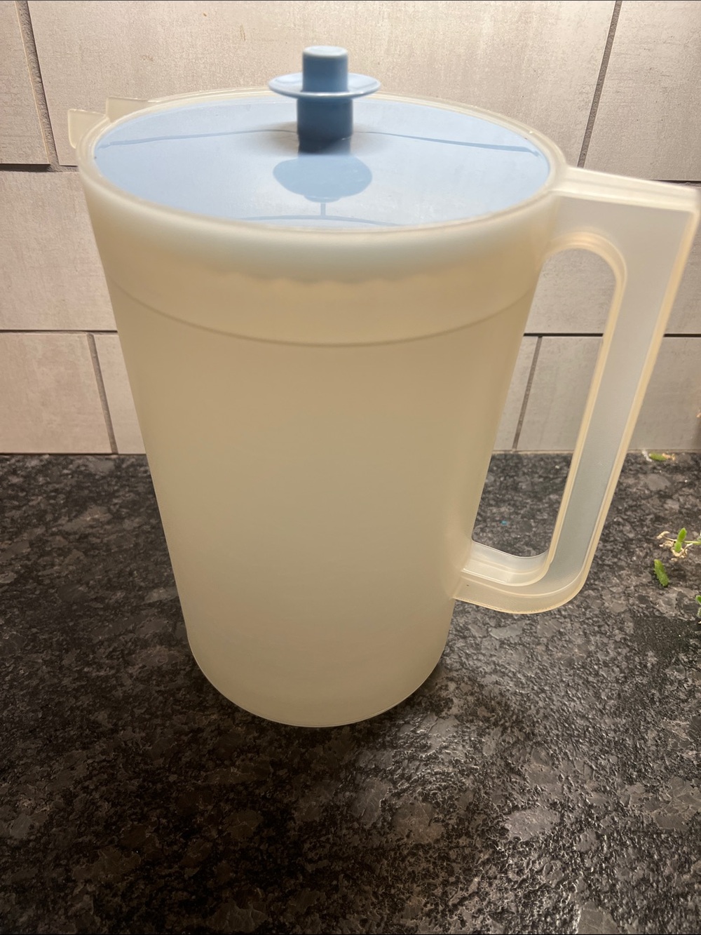 Vintage 1 Gallon Tupperware Translucent Plastic Pitcher with Light Blue Lid.